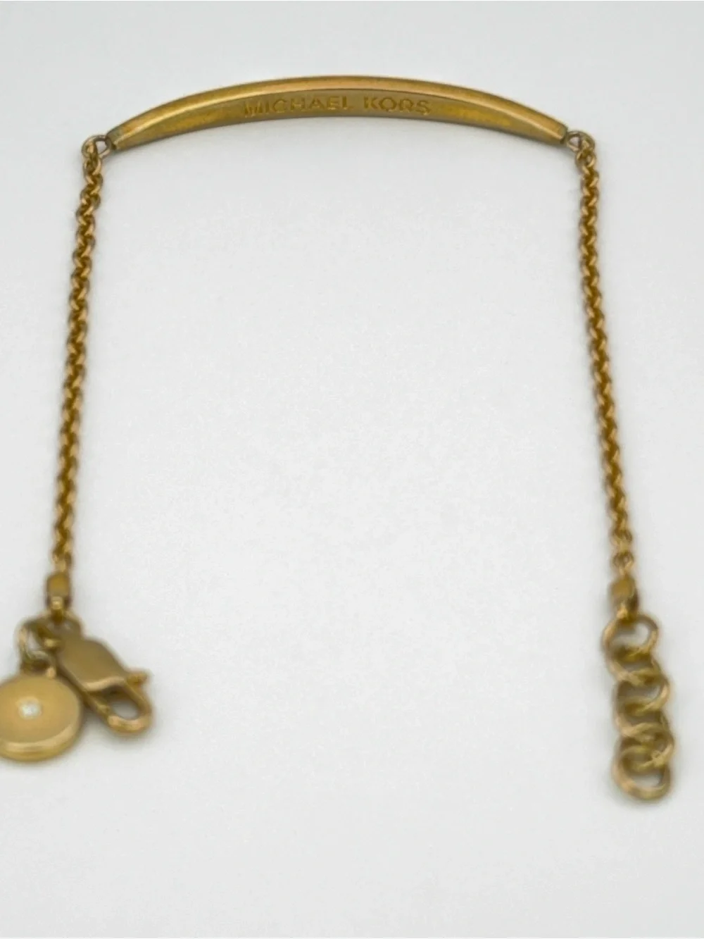 Gold-tone MK Michael Kors pavé curved bar Bracelet